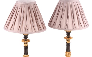 A PAIR OF PATINATED AND GILT METAL TRIFORM CANDLESTICKS, CIRCA 1820 AND LATER CONVERTED