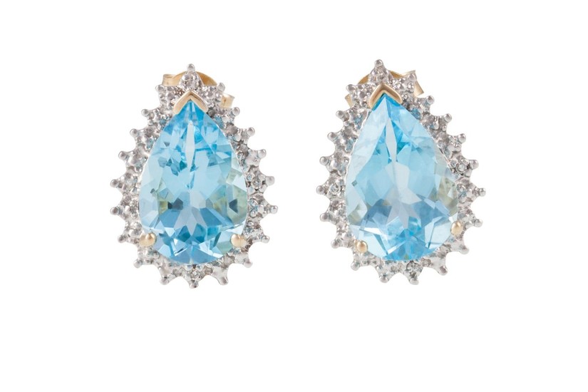 A PAIR OF TOPAZ AND DIAMOND CLUSTER EARRINGS, mounted in whi...