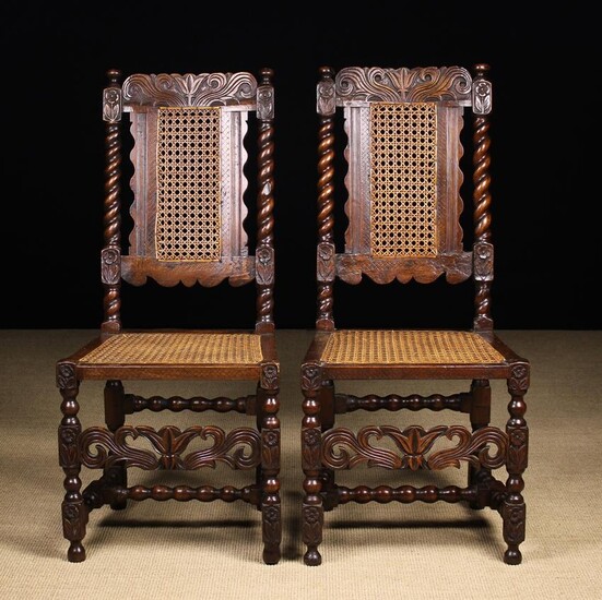A Pair of Charles II Carved Walnut...