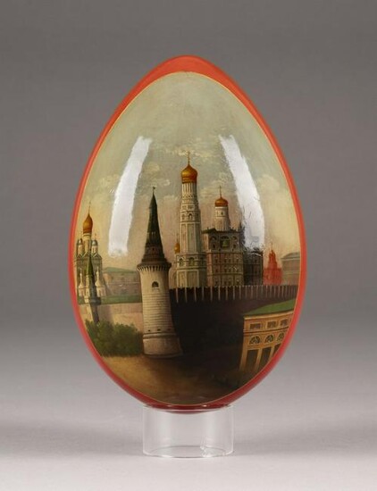 A RED LACQUERED PAPIER-MACHÃ‰ EASTER EGG