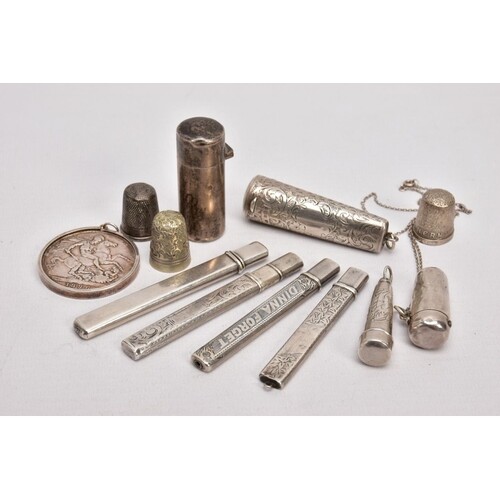 A SELECTION OF SILVER ITEMS, to include four silver pencil c...
