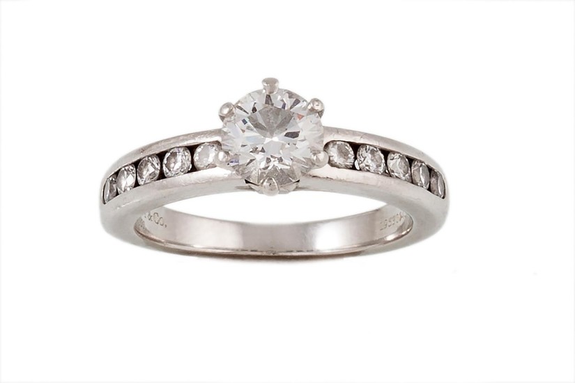 A SOLITAIRE DIAMOND RING, with Tiffany cert stating the diam...