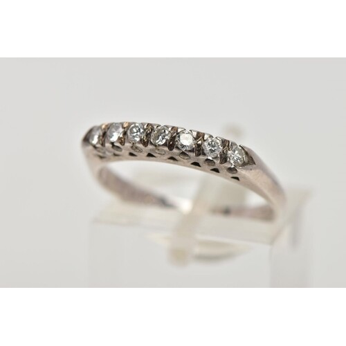 A WHITE METAL DIAMOND HALF ETERNITY RING, designed with a ro...