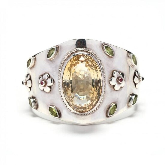 A Wide Silver and Gem-Set Bangle