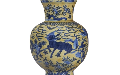 A YELLOW-GROUND BLUE AND WHITE BALUSTER VASE CHINA