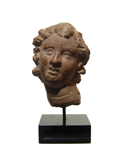 A beautiful Hellenistic terracotta head of a woman