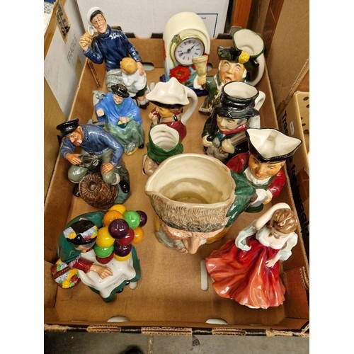 A box of assorted ornaments including four Royal Doulton fig...