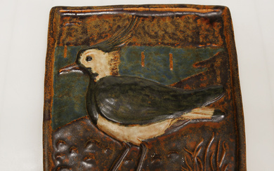 A ceramic plate, bird motif, Tofsvipa, signed on verso Eje Nielsen, Denmark ca. in 1967.