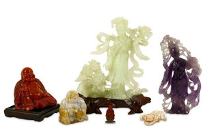 A collection of Chinese figurative hard stone carvings...