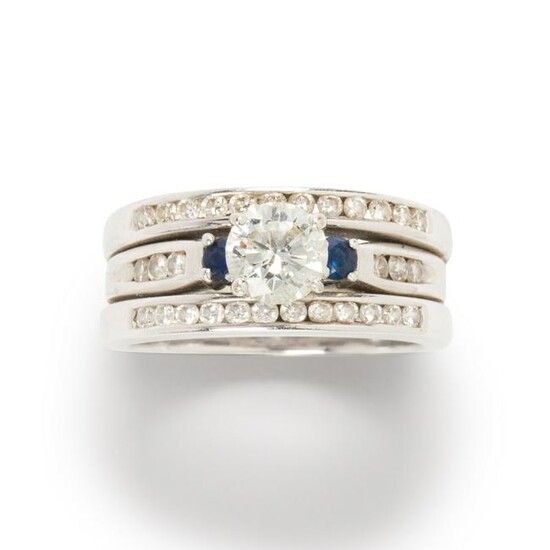 A diamond and eighteen karat white gold wedding ring