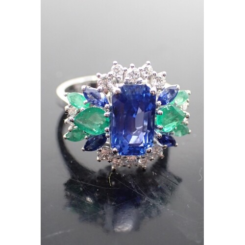 A diamond, sapphire and emerald cluster ring, set in 18ct go...