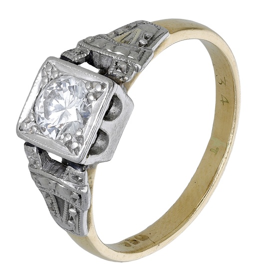A diamond single stone ring, the bicoloured ring set with a brilliant-cut...