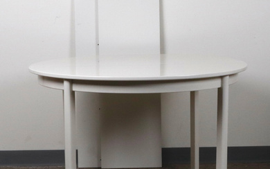 A dining table, painted white, 20th century.