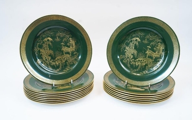 A group of fifteen Spode dinner plates, 20th century, of green ground with gilded Chinoiserie landscape to the well and gilded borders, each 26.7cm diameter (15)