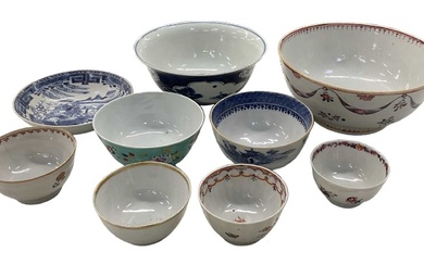 A group of nine Chinese Export bowls including floral decorated...