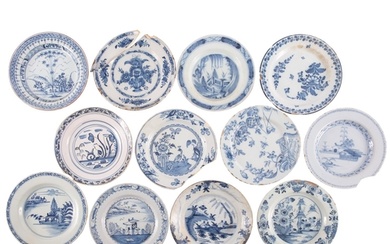 A group of sixteen English and Dutch blue and white delftwar...