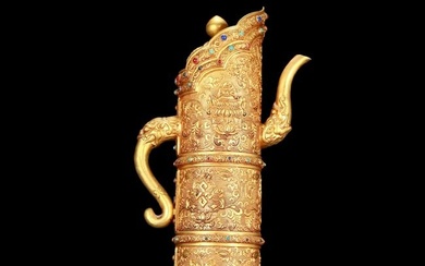 A huge gilt bronze ewer with floral and dragon patterns