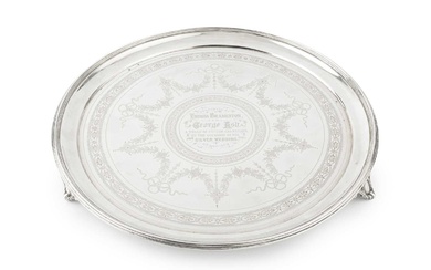 A late Victorian silver circular salver, with reeded border and...
