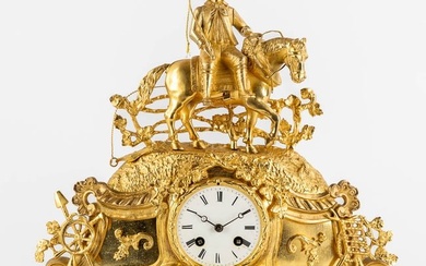 A mantle clock with a 'Horse Rider', gilt bronze. France, 19th C. (L:11,5 x W:38 x H:37 cm)