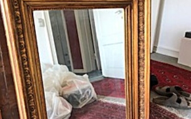 NOT SOLD. A mirror in frame of gilded carved wood, 19th century H. 80. W....