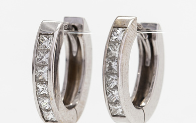 A pair of 18K white gold earrings, with diamonds totaling approx. 0.62 ct. Lanza Carlo, Italy.