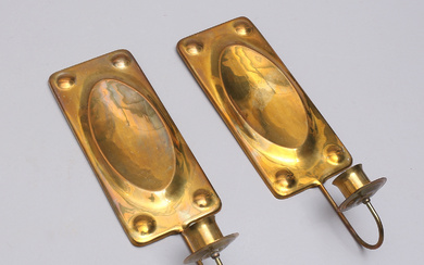 A pair of 20th century brass candlesticks.