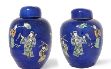 A pair of Chinese powder blue-ground famille verte jars and covers Late...
