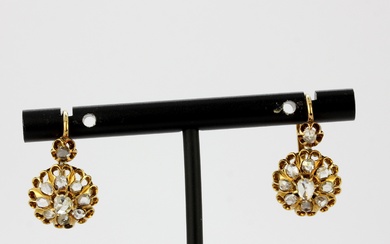 A pair of Edwardian 18ct yellow gold (tested) earrings set with rose cut diamonds, L. 2cm.