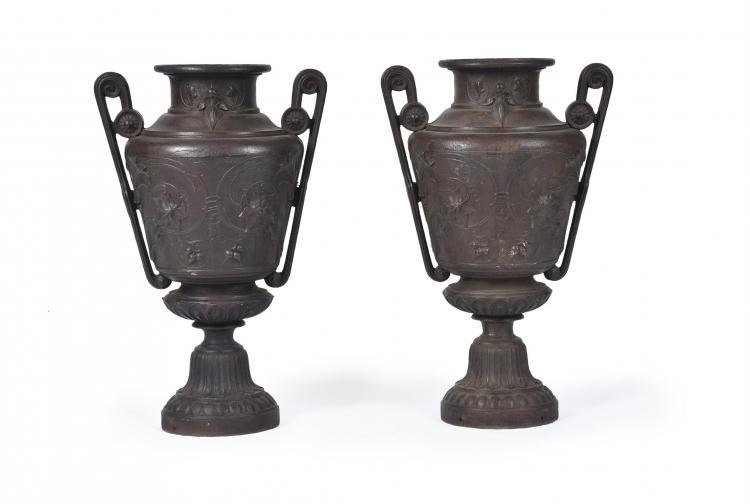 A pair of French cast iron urns in Neoclassical style attributed to Barbezat & Cie
