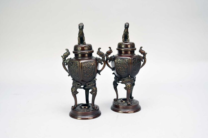 A pair of Japanese bronze koro and covers