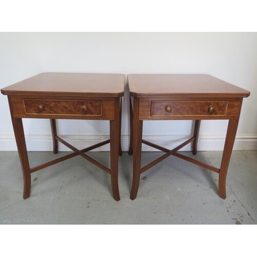 A pair of burr wood veneer lamp tables each with a drawer on...