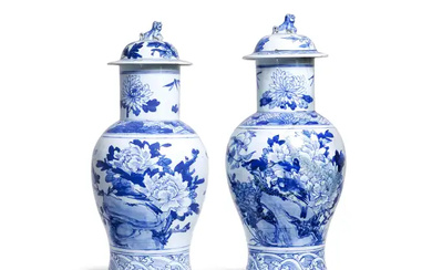 A pair of large Chinese blue and white vases and covers Qing...