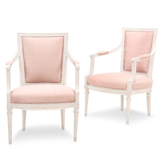 A pair of painted late Gustavian armchairs. Sweden, early 19th century. (2).