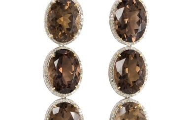 A pair of smoky quartz, diamond, silver and 14k gold earrings