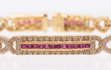 A ruby and diamond 18ct gold bracelet, comprising elongated panels,...