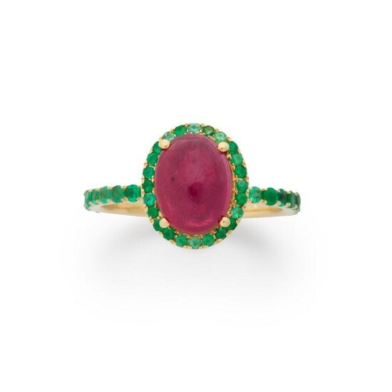 A ruby, emerald and eighteen karat gold ring