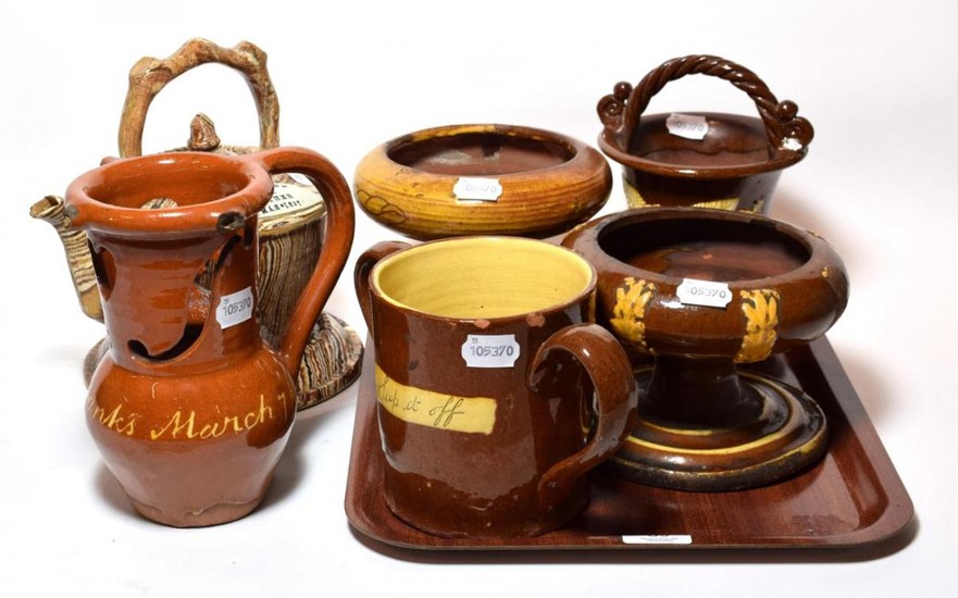 A selection of 19th century slip ware including: frog loving...