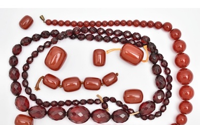 AN ASSORTMENT OF BAKELITE CHERRY AMBER BEADS, to include a n...