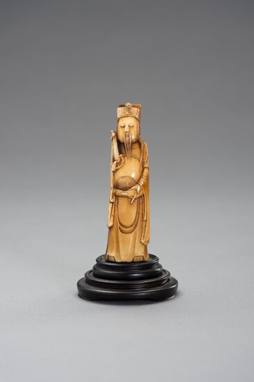 AN IVORY CARVING OF AN IMMORTAL, MING
