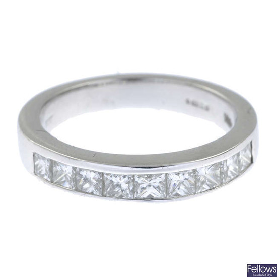 An 18ct gold square-shape diamond half eternity ring.