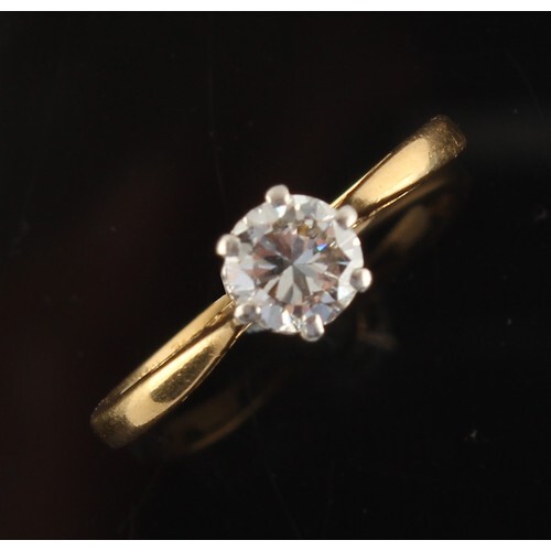 An 18ct yellow gold diamond single stone ring, the round bri...