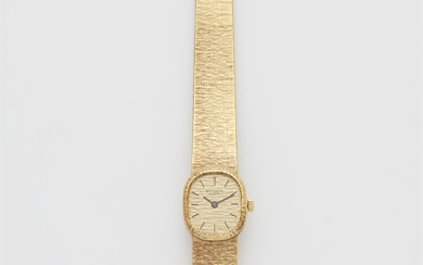 An 18k yellow gold Ellipse Patek Philippe ladies wristwatch.