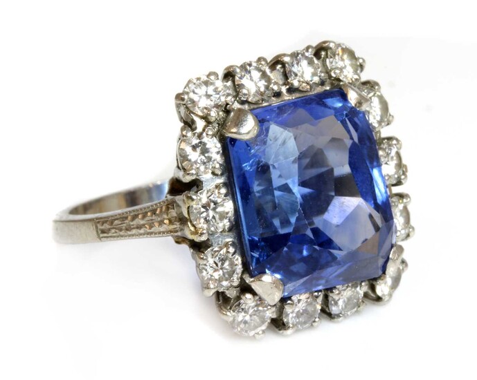 An American sapphire and diamond cushion-shaped cluster ring