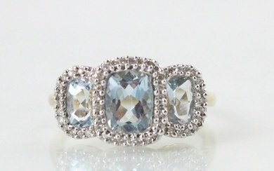 An Edwardian style untested blue topaz triple cluster ring, ...