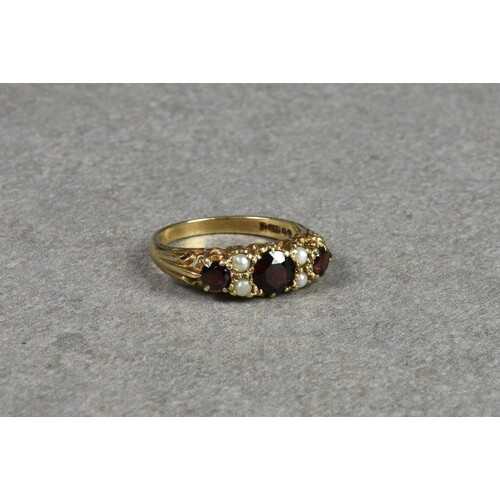 An antique style 9ct gold, garnet and seed pearl ring, size ...