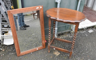 An early 20th Century oak occasional table (59 x 42cm) and Victorian oak mirror (79 x 52cm)