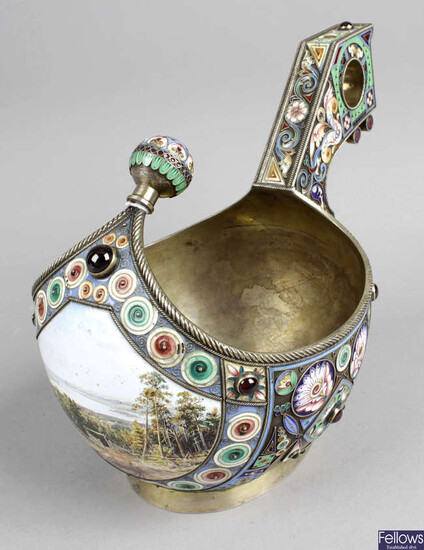 An early 20th century Russian silver and enamel kovsh.