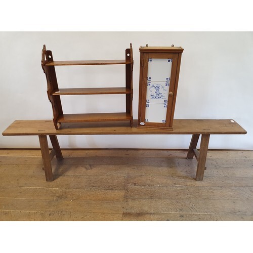 An oak bench, 178 cm wide, an oak wall shelf, 57 cm wide, an...
