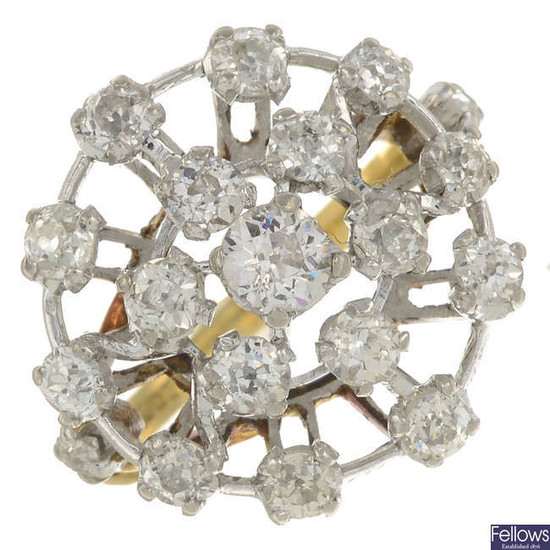 An old-cut diamond cluster ring.