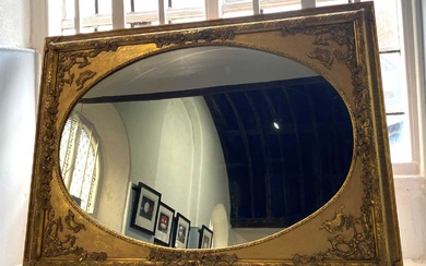 An ornate Georgian revival gilt framed wall mirror